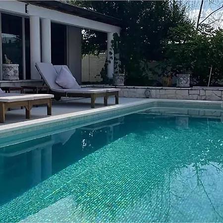 Awesome In With Heated Swimming Pool Holiday home